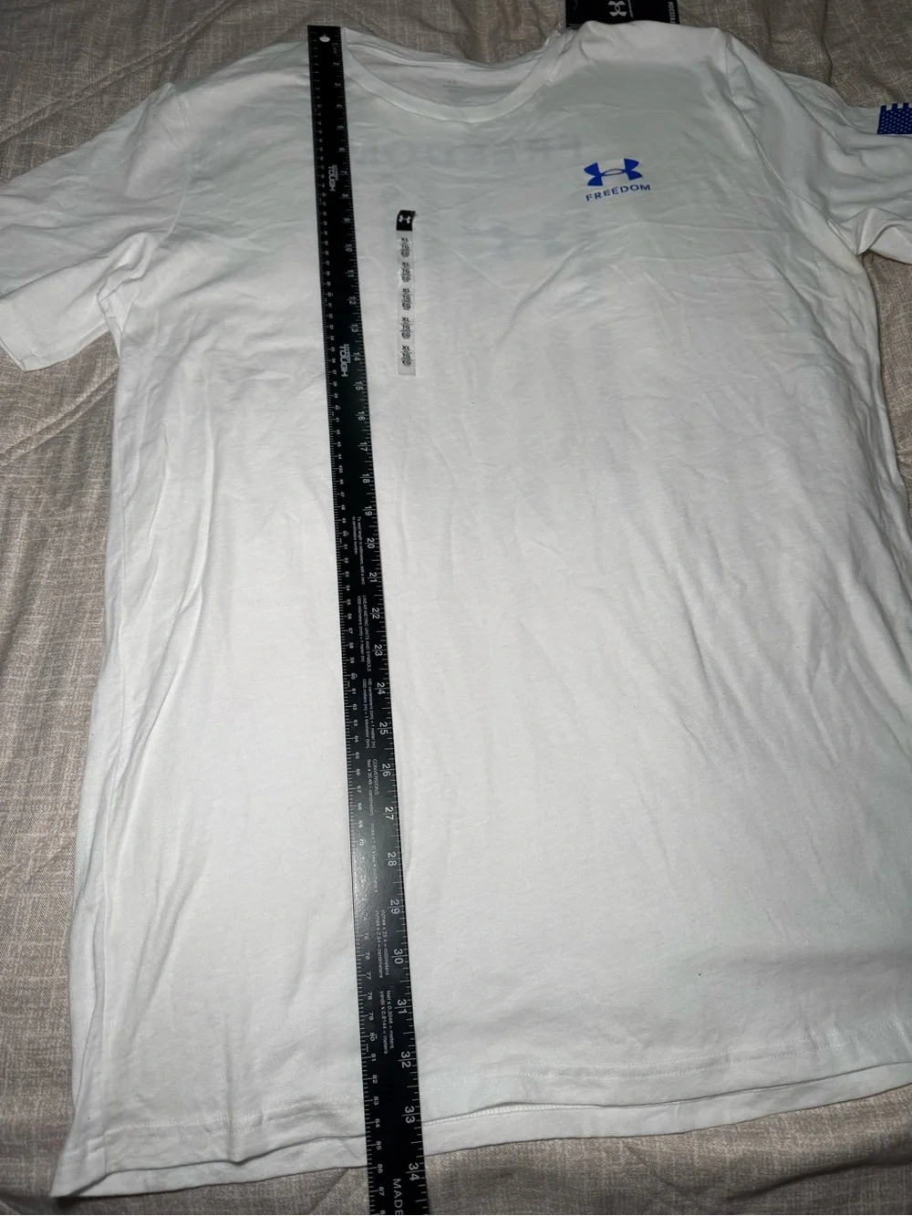 Under Armour White Short Sleeve Freedom Performance Tee with Blue Logo